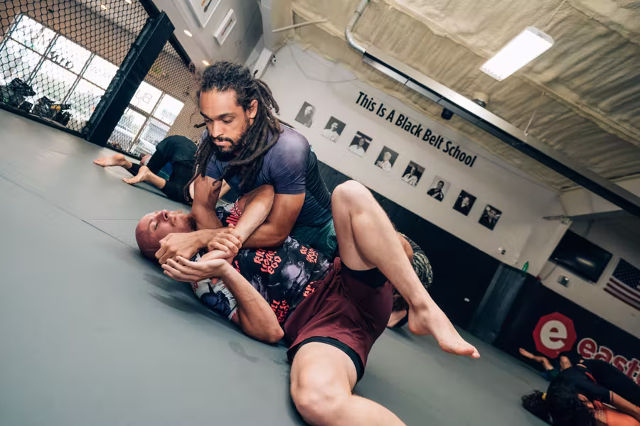 Competitors working positions in a no-gi round
