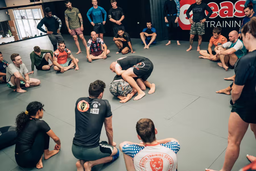 Students circled around a no-gi demonstration in Denver