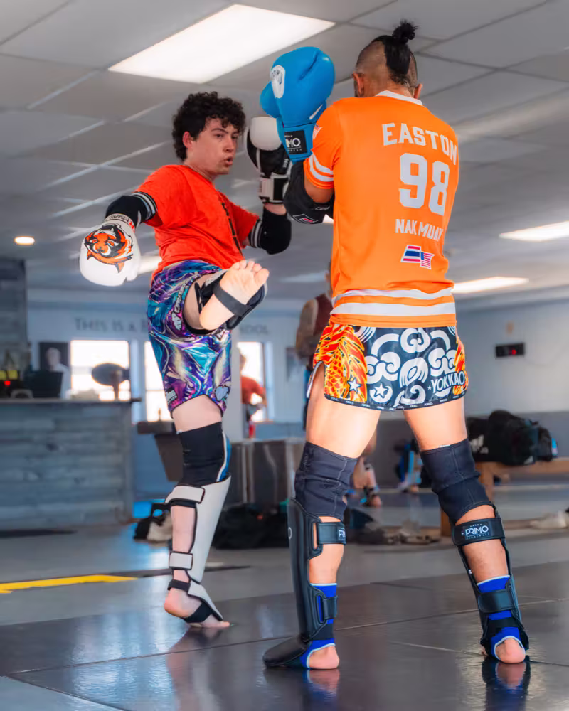 Kick check during a Muay Thai round at Easton Littleton