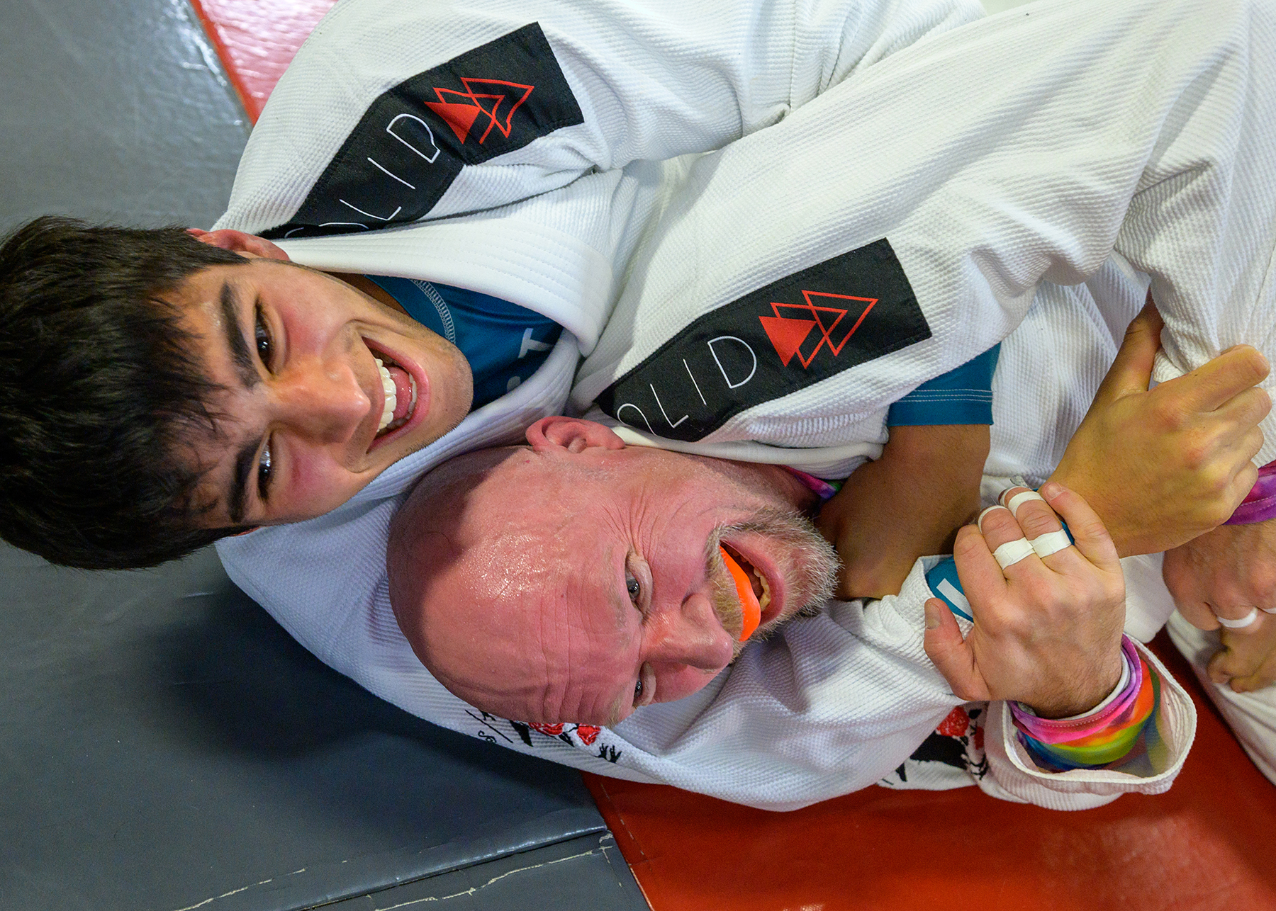 Two Brazilian Jiu-Jitsu students training at our Martial Arts academy in Denver.