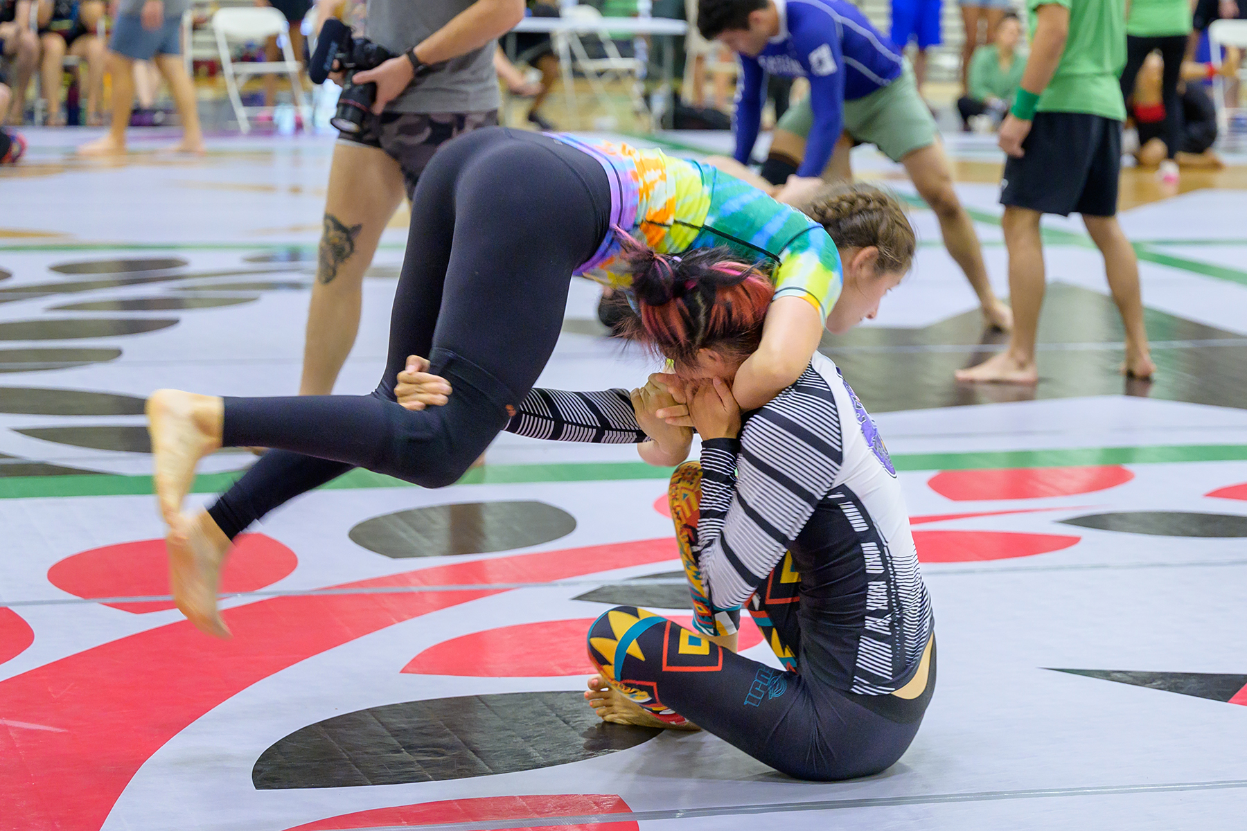 An image of two girls competing at the Easton Open, a Brazlian jiu-jitsu competition for all Easton academies in Colorado.