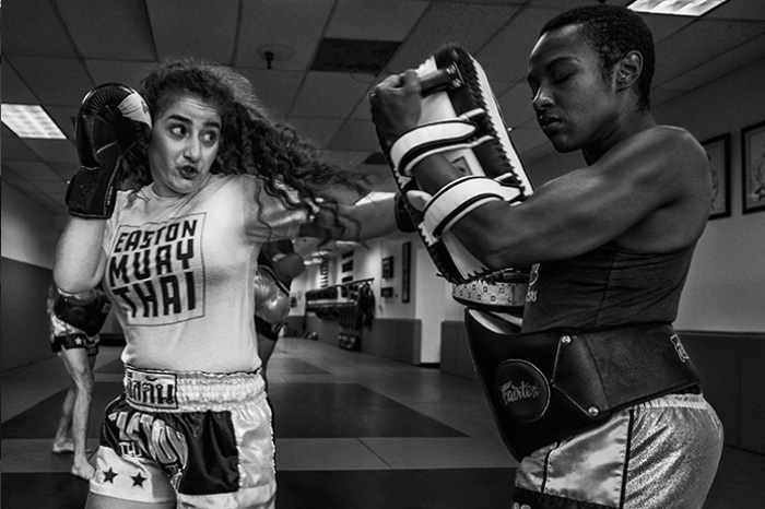 An image of two women practicing Muay Thai at Easton Training Center in Colorado.
