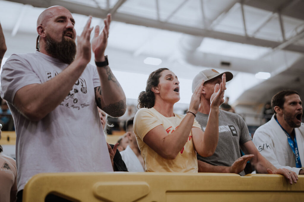 Professor Alex Huddleston cheers from the sidelines of the IBJJF Denver Open