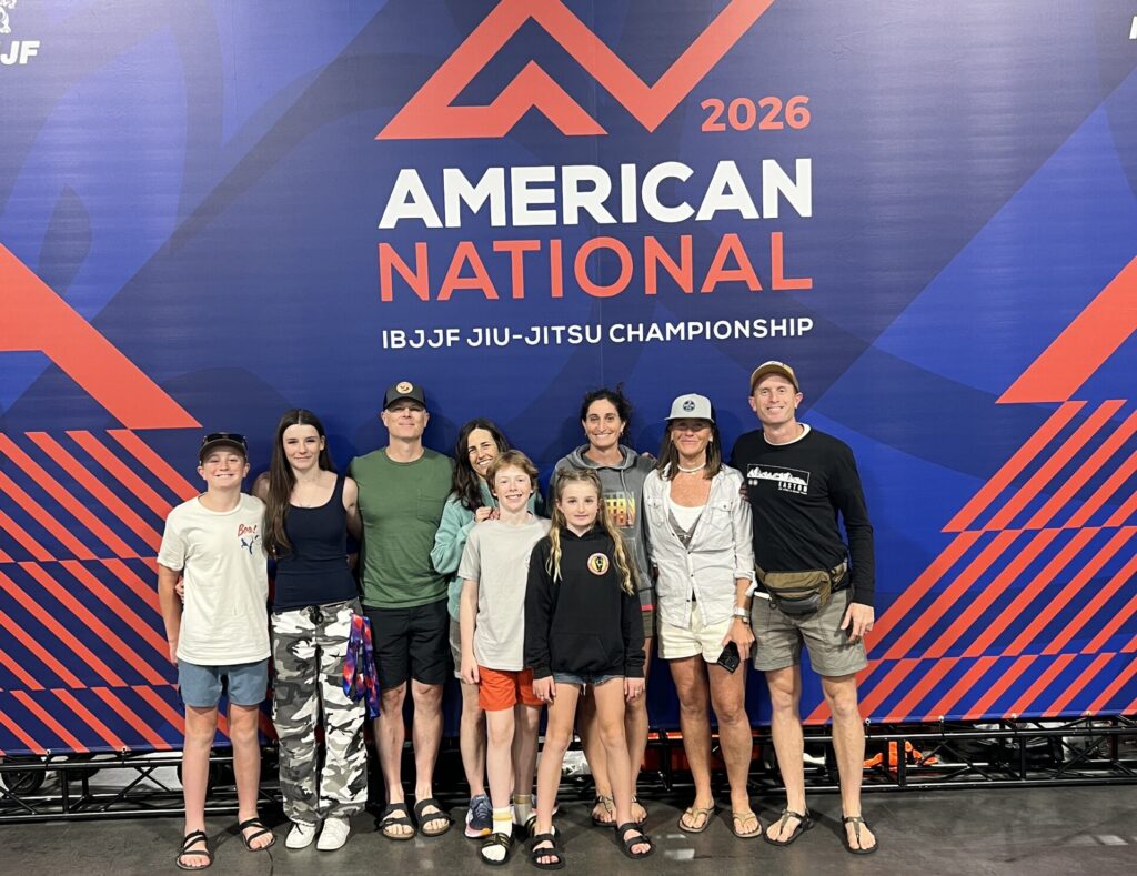 Group photo in front of the American National backdrop
