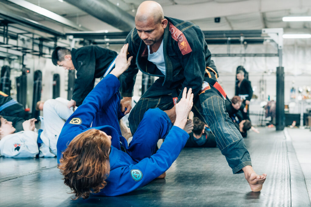 History of the IBJJF - two men in bjj gis open guard