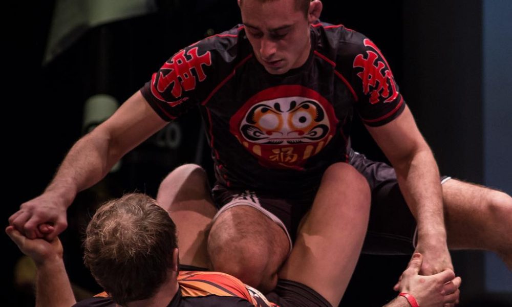 Jason Rau in the top of open guard in no-gi BJJ competition