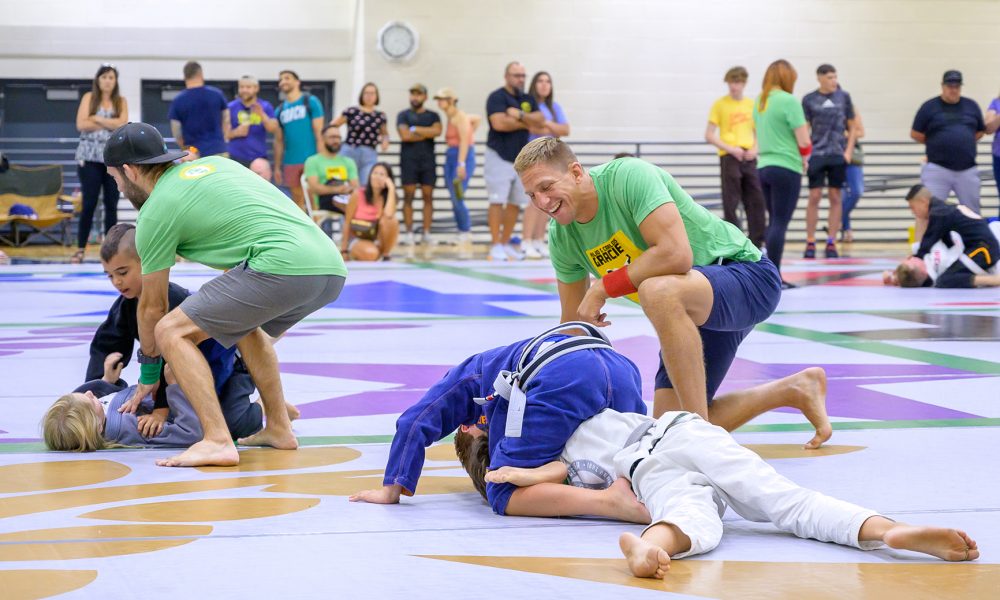 An image of two boys during a Jiu-Jitsu competition named "Easton Open", which is for all Easton martial arts academies in the state of Colorado.