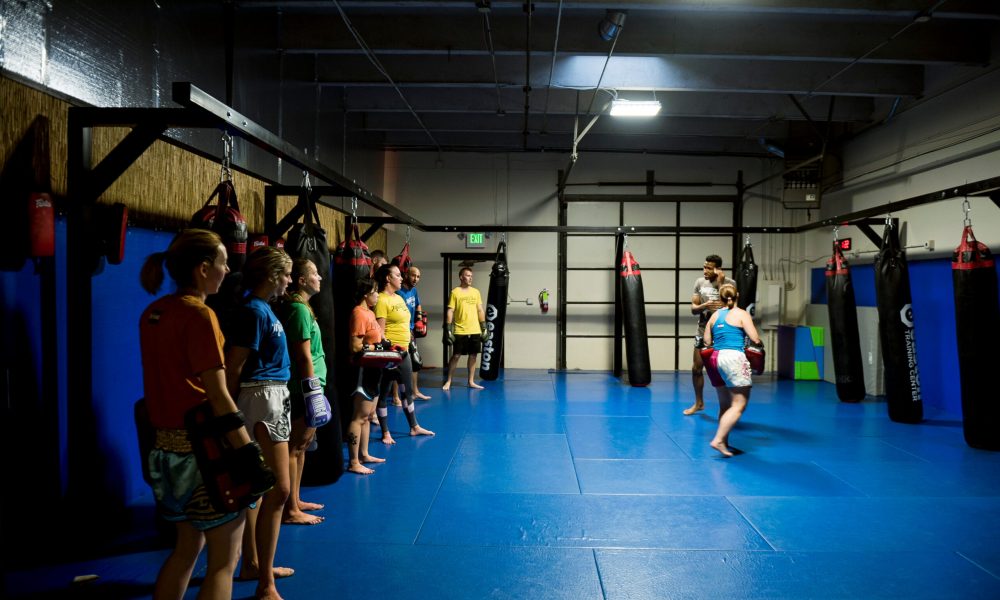 Coaches Pat and Wes leading a Muay Thai class