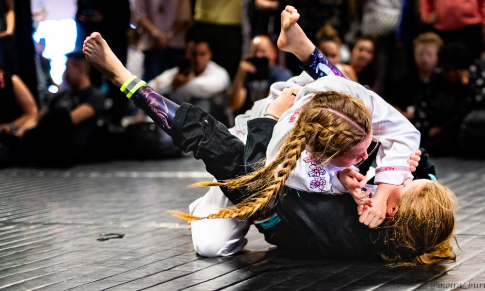 two girls grapple in the in-house tournament at Easton BJJ.