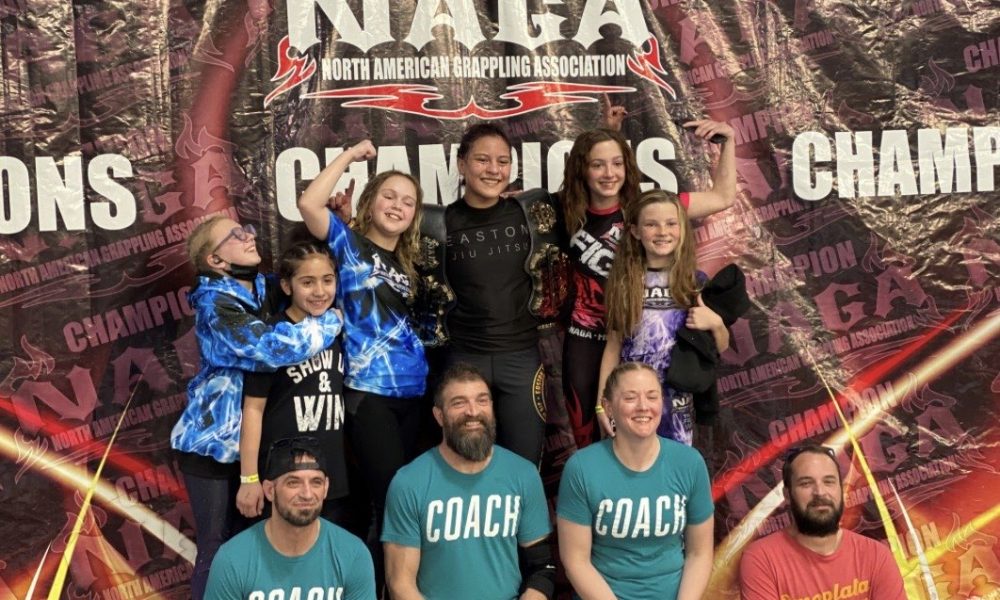 Easton Littleton kids competitors with coaches at a NAGA tournament