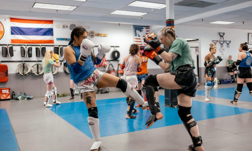 women in a muay thai sparring event